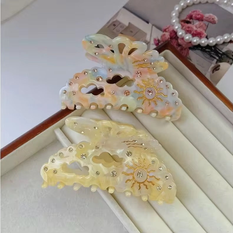 SUN CLOUD CLAW