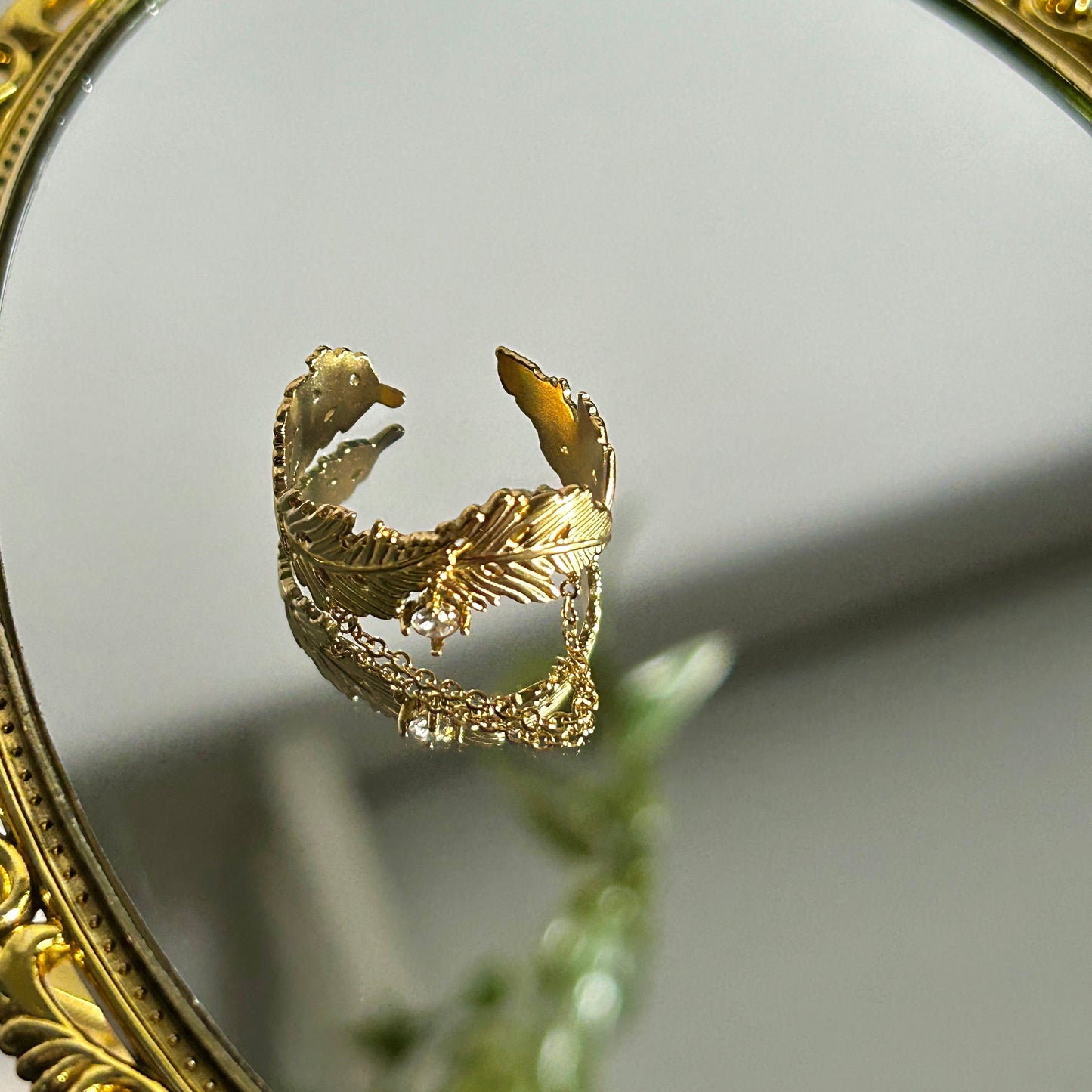 FEATHER RING