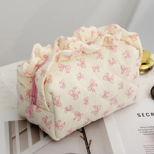 RUFFLE KNOT POUCH