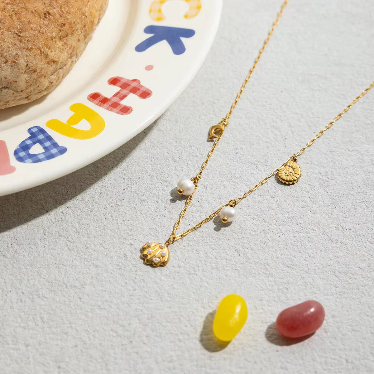 SEAPEARL CHARMS NECKLACE